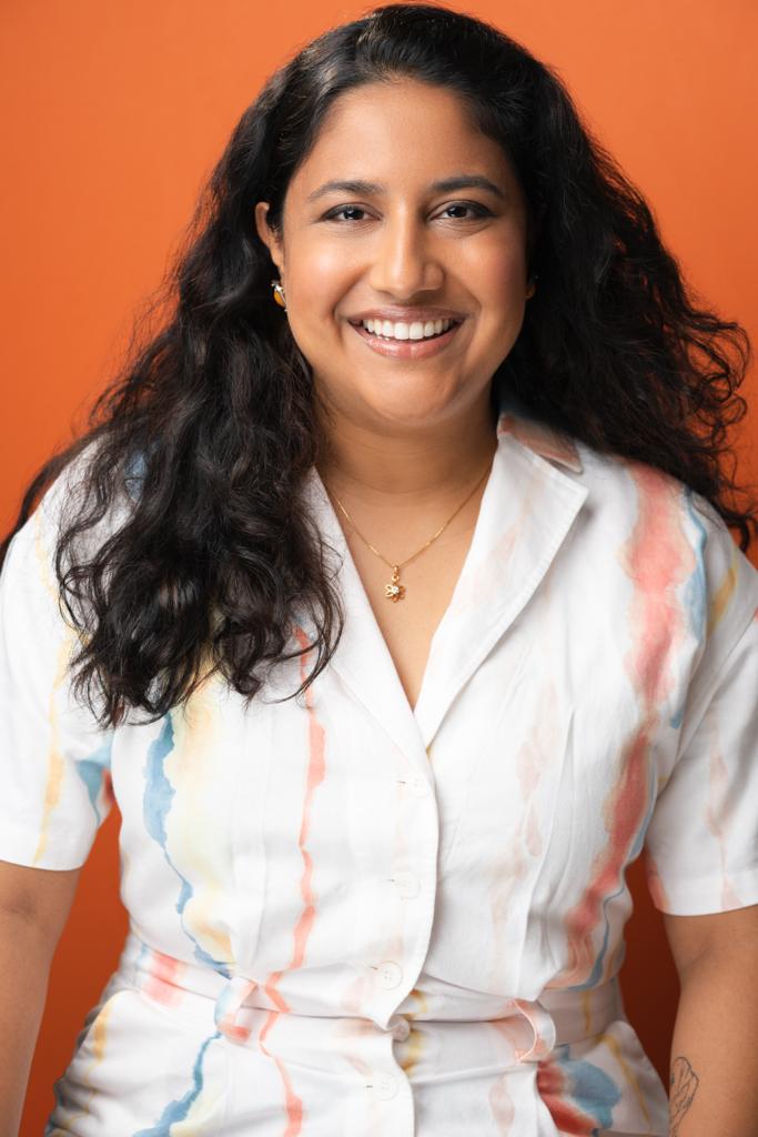 orange backdrop headshot